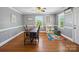 Dining area with wood floors, bright windows, and a play area at 7617 Pleasant Hill Church Rd, Marshville, NC 28103