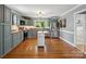 Modern kitchen with updated stainless steel appliances and custom-color cabinets at 7617 Pleasant Hill Church Rd, Marshville, NC 28103