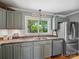 Updated kitchen with stainless appliances, and stylish countertops at 7617 Pleasant Hill Church Rd, Marshville, NC 28103