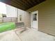 Inviting back patio featuring a porch swing, perfect for relaxing and enjoying the outdoors at 807 Oak Manor Se Dr, Concord, NC 28025