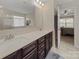 Bathroom featuring double vanity sinks and access to both tub and shower at 807 Oak Manor Se Dr, Concord, NC 28025