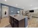 Kitchen island overlooking the dining and living areas at 807 Oak Manor Se Dr, Concord, NC 28025