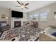 Bright living room with a fireplace and entertainment center at 807 Oak Manor Se Dr, Concord, NC 28025
