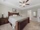 Spacious main bedroom with carpet, trey ceiling and neutral paint at 807 Oak Manor Se Dr, Concord, NC 28025
