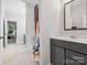 Bathroom featuring a dark vanity, tub/shower with curtain, and light tile flooring at 811 Penny Royal Ave, Fort Mill, SC 29715
