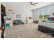 Bright bedroom with carpet, display shelves, a ceiling fan, and large window at 811 Penny Royal Ave, Fort Mill, SC 29715