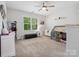 Bedroom with carpet, a bunk bed, ceiling fan, large window, and dresser at 811 Penny Royal Ave, Fort Mill, SC 29715