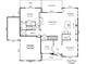 First floor plan outlining the layout including garage, kitchen, living spaces, and dining area at 811 Penny Royal Ave, Fort Mill, SC 29715