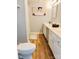Functional bathroom featuring a vanity with drawers, a neutral color scheme, and modern fixtures at 9404 Robert Burns Ct, Charlotte, NC 28213