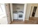 Laundry closet with washer and dryer at 101 N Ferncliff Dr, Mount Holly, NC 28120