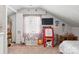 Bright bedroom featuring ample natural light and creative decor, perfect for inspiring imagination and play at 103 Claremont Way, Mooresville, NC 28117