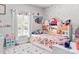 Charming bedroom with playful decor, a cozy bed, and built-in shelving, creating a delightful and functional space at 103 Claremont Way, Mooresville, NC 28117