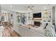Inviting living room features a fireplace with built-in shelves and a comfortable couch at 103 Claremont Way, Mooresville, NC 28117