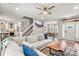 Spacious living room with open floor plan and view of the staircase and dining area at 103 Claremont Way, Mooresville, NC 28117
