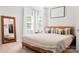 Bright main bedroom with natural light, neutral walls, and a soft color palette at 103 Claremont Way, Mooresville, NC 28117
