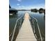 Long pier with wooden planks, metal railings, and gorgeous views of Lake Norman at 103 Claremont Way, Mooresville, NC 28117