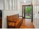 Inviting foyer features hardwood floors, a wooden bench, and a view of the outdoors at 109 Canterbury Ln, Matthews, NC 28104