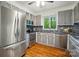 Modern kitchen with stainless steel appliances and updated countertops at 109 Canterbury Ln, Matthews, NC 28104