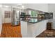 Updated kitchen featuring stainless steel appliances and granite countertops at 109 Canterbury Ln, Matthews, NC 28104
