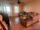 Comfortable living room featuring a plush sectional sofa and ceiling fan at 109 Wilson Acres Dr, Kings Mountain, NC 28086