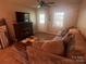 Inviting living room area with a fireplace and a comfortable sectional sofa at 109 Wilson Acres Dr, Kings Mountain, NC 28086