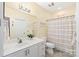 Traditional bathroom with a single sink vanity, toilet, and shower-tub combination at 11346 Olde Turnbury Ct, Charlotte, NC 28277