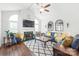 Spacious living room featuring a fireplace, large windows, and vaulted ceilings at 11346 Olde Turnbury Ct, Charlotte, NC 28277