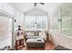 Bright sunroom with brick accents and lots of windows at 11346 Olde Turnbury Ct, Charlotte, NC 28277