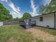 The deck overlooks the grassy backyard and patio area at 1159 Ragan Dr, Gastonia, NC 28054