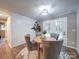 Charming dining area with a round table, comfortable chairs, and a view to the deck at 1159 Ragan Dr, Gastonia, NC 28054