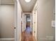 Bright hallway showing access to multiple rooms in home at 1159 Ragan Dr, Gastonia, NC 28054