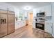 Modern kitchen featuring stainless steel appliances, white cabinetry, and stylish backsplash at 1159 Ragan Dr, Gastonia, NC 28054
