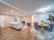 Inviting open-concept living space with modern decor, dining area, and comfortable seating at 1159 Ragan Dr, Gastonia, NC 28054