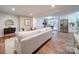 Bright living room with hardwood floors, stylish furniture, and an open view to the kitchen at 1159 Ragan Dr, Gastonia, NC 28054
