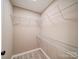 Spacious walk-in closet with custom shelving for optimal organization at 1159 Ragan Dr, Gastonia, NC 28054