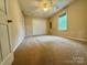 Large carpeted bedroom features neutral walls, and a storage closet at 117 24Th Nw St # 41, Hickory, NC 28601