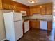 Well-lit kitchen features wooden cabinets, modern appliances, and ample counter space at 117 24Th Nw St # 41, Hickory, NC 28601