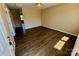 Spacious living room features wood floors and bright natural light, creating a warm and inviting atmosphere at 117 24Th Nw St # 41, Hickory, NC 28601