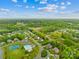 Discover this beautiful neighborhood with lush greenery and amenities, shown from an aerial view at 130 Weeping Spring Dr, Mooresville, NC 28115