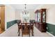 Formal dining room with a large wooden table, perfect for hosting gatherings at 130 Weeping Spring Dr, Mooresville, NC 28115