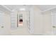 Large walk-in closet featuring custom shelving and ample storage space inside the primary suite at 130 Weeping Spring Dr, Mooresville, NC 28115