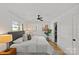 Bright bedroom with hardwood floors, a ceiling fan, and natural light at 1330 Dean St, Charlotte, NC 28216