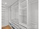 Walk-in closet with custom shelving and drawer systems for optimal organization at 1330 Dean St, Charlotte, NC 28216