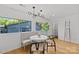 Well-lit dining space with natural wood floors and modern fixtures at 1330 Dean St, Charlotte, NC 28216