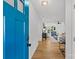 Bright entryway featuring hardwood floors and an open view into the stylishly furnished living spaces at 1330 Dean St, Charlotte, NC 28216