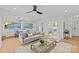 Sunlit living room with a comfortable sofa and stylish accents at 1330 Dean St, Charlotte, NC 28216