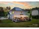 Relaxing backyard featuring a deck with pergola and outdoor furniture at 139 Autumn Grove Ln, Mooresville, NC 28115