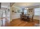 Elegant dining room with wood floors and stylish decor at 139 Autumn Grove Ln, Mooresville, NC 28115