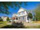 Attractive two-story home featuring a well-maintained lawn, stone accents, and charming curb appeal at 139 Autumn Grove Ln, Mooresville, NC 28115