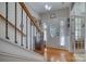 Inviting foyer with hardwood floors and a staircase at 139 Autumn Grove Ln, Mooresville, NC 28115